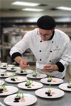 Photograph of a Chef at Liv Restaurant plating an appetizer dish by Niagara Photographer Yungblut