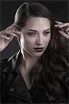 Fashion Models with long hair poses in a leather jacket for a mall lookbook ad by Niagara Photographers