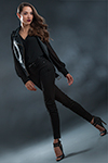 Fashion Model wears black leather jacket and pants against a blue backdrop to advertise Mall Fashions by Niagara Photographer